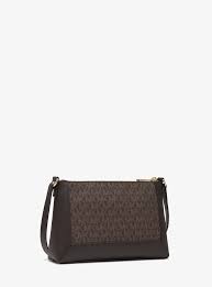 Túi đeo Michael Kors - TXN BI2502 MK 4857